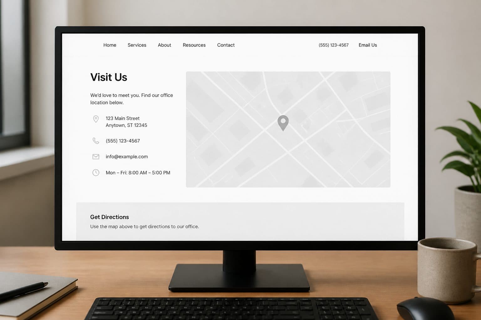 Simple webpage with a gray map placeholder; no third-party overlay chrome on the screen.